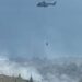 (VIDEO) Zjarr i madh në Dhërmi, ndërhyrje nga ajri me helikopter, rrezikohen 30 banesa