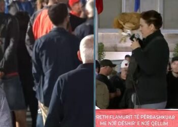 Protestuesja merr pulën në podium, thirrje Ramës: Me burrat nuk merresh dot! Do veshësh fustanin dhe do ja mbathësh