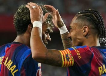 Tripleta e Rafinjas përmbys Sevijan, katalanasit marshojnë në La Liga